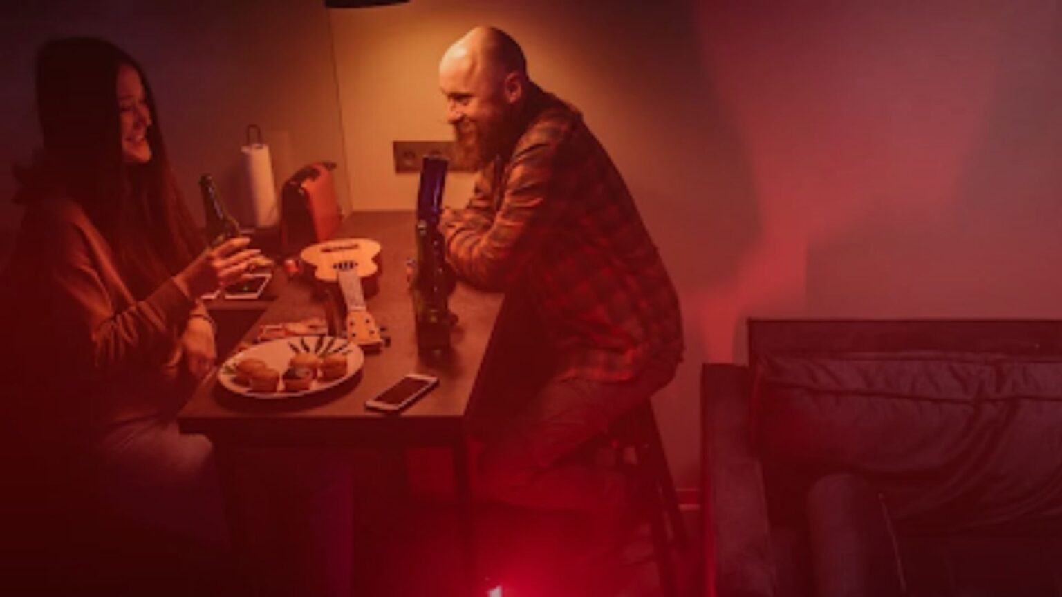 Woman and Man Sitting at a Table