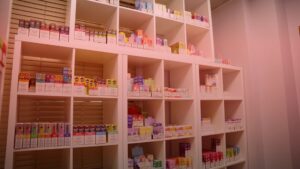 Nature's Canopy House Shelves filled with various boxed medicine and health products in a well-lit room. Dispensary In Mississauga